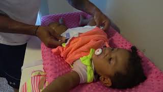 How to change a baby girl diaper [upl. by Lalaj]