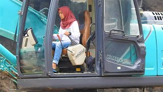 Devita Trying Kobelco SK20010 Excavator Loading Dump Truck [upl. by Wesle]