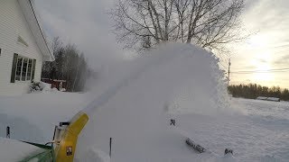 John Deere 3039R snowblower vs blizzard [upl. by Llydnek]